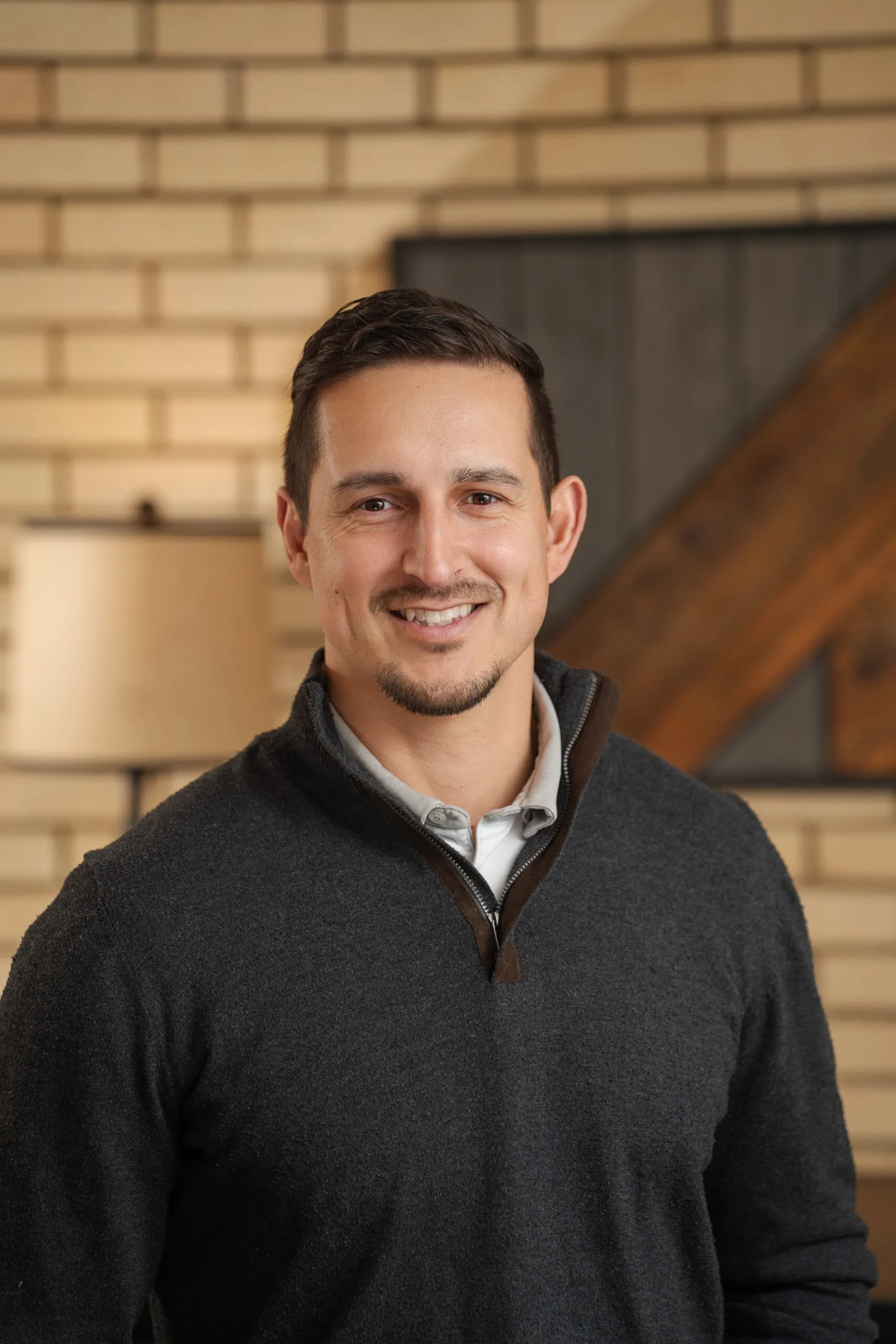 A professional portrait of [Name], a team member at One Heart Warriors dedicated to Native leadership development and community restoration.