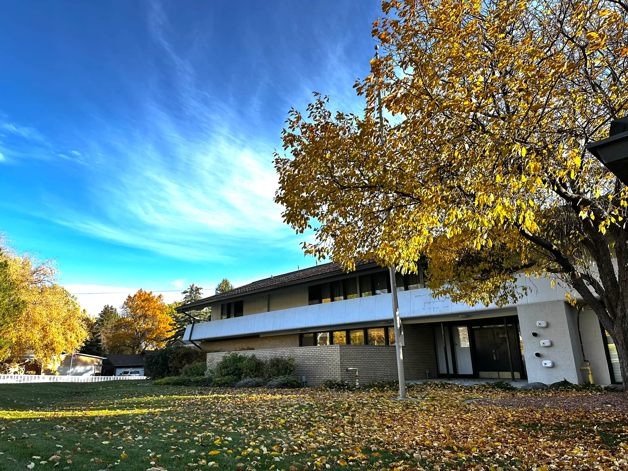 The One Heart Warriors community center building during autumn, serving as a hub for Native leadership development and outreach.